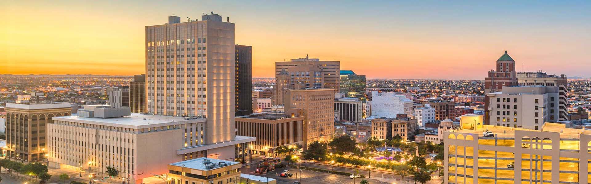 Neon color image of a band playing and people singing along